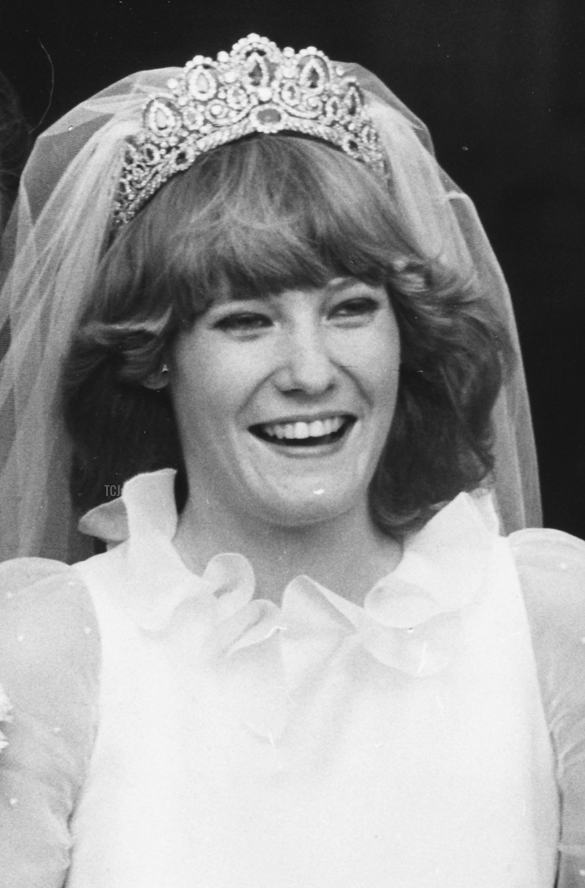 Gerald Grosvenor, 6th Duke of Westminster, and his new wife Natalia Phillips smiling happily on their wedding day outside St Mary's Church, Luton, February 20th 1978