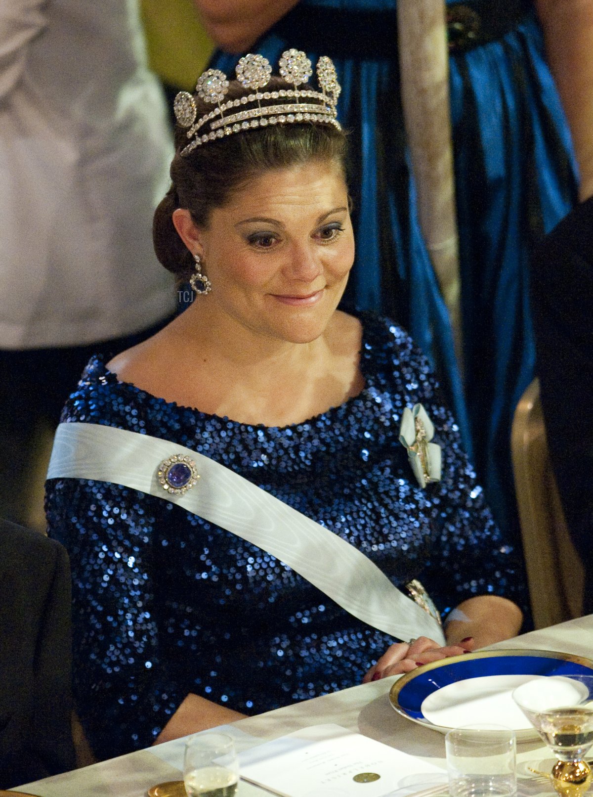 La Principessa Vittoria di Svezia reagisce al tavolo d'onore durante il banchetto Nobel seguito alla cerimonia di premiazione del Premio Nobel tenutasi presso il municipio di Stoccolma il 10 dicembre 2011