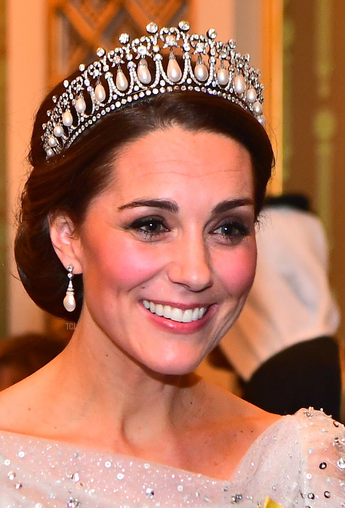 Catherine, Duchess of Cambridge greets guests at an evening reception for members of the Diplomatic Corps at Buckingham Palace on December 04, 2018 in London, England