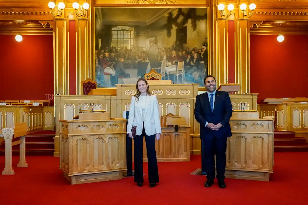 Princess Ingrid Alexandra of Norway and President of the Norwegian Parliament Masud Gharahkhani pose at the Norwegian parliament in Oslo during an official visit on January 20, 2022