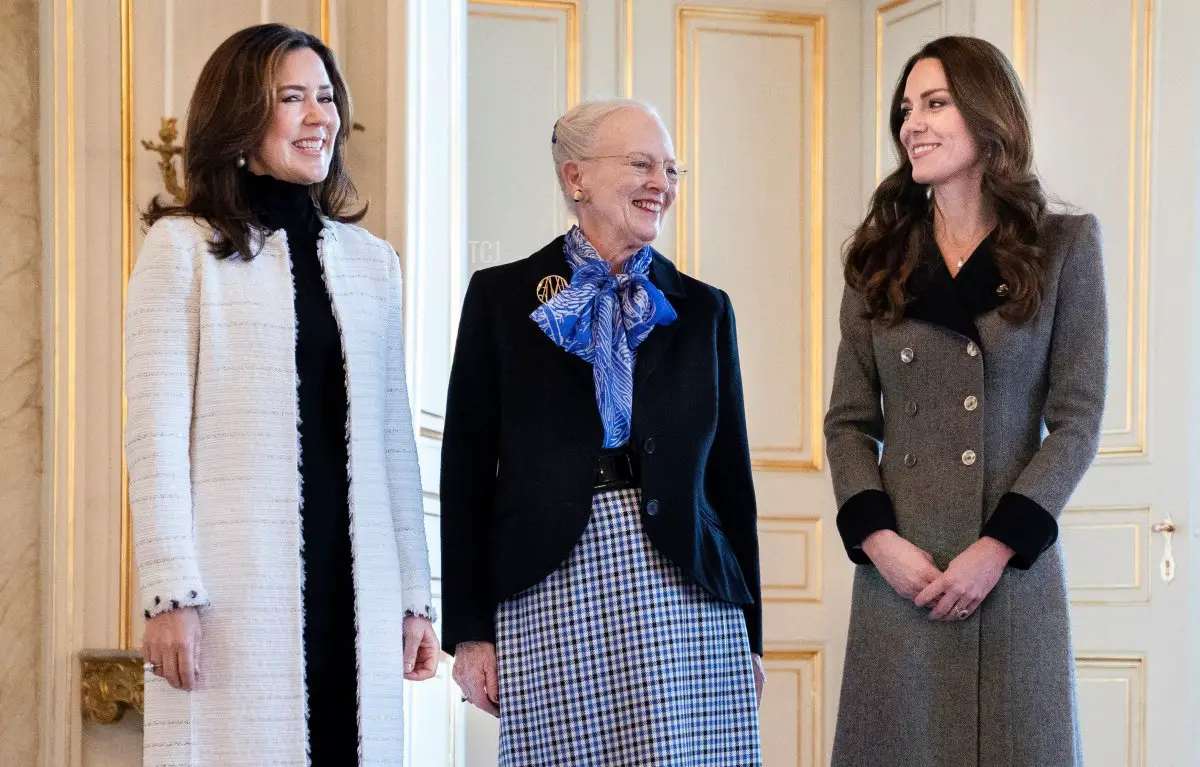 Queen Margrethe II of Denmark (C) and Crown Princess Mary of Denmark (L) welcome Britain's Catherine (R), Duchess of Cambridge, at Amalienborg Castle in Copenhagen on February 23, 2022 as part of her two-day visit to Denmark