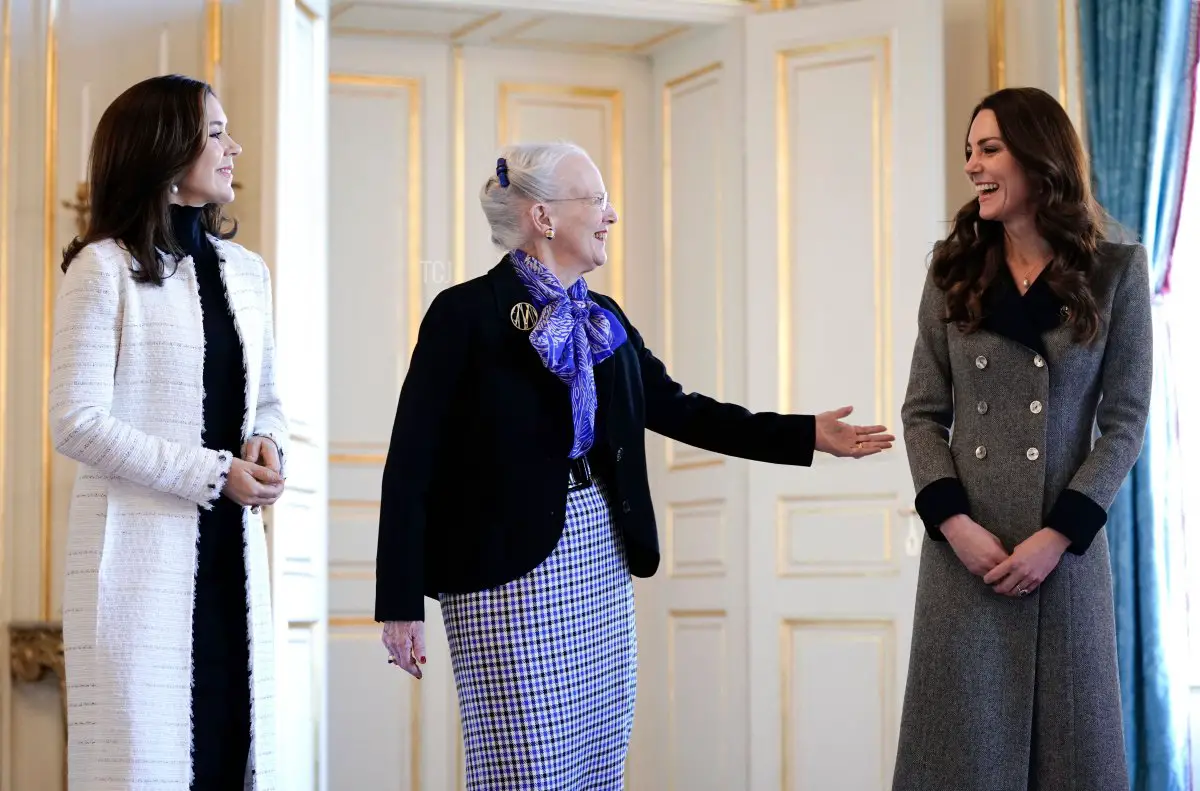 Queen Margrethe II of Denmark (C) and Crown Princess Mary of Denmark (L) welcome Britain's Catherine (R), Duchess of Cambridge, at Amalienborg Castle in Copenhagen on February 23, 2022 as part of her two-day visit to Denmark