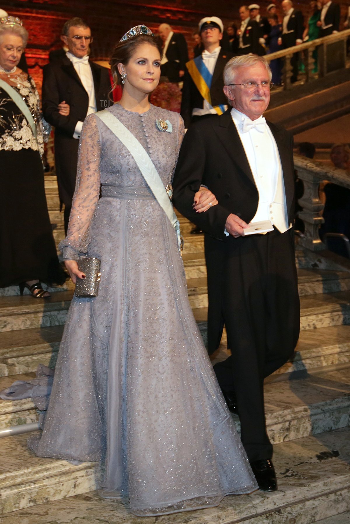 La Principessa Madeleine di Svezia (L) e il co-vincitore del Premio Nobel per la Chimica 2015 Paul Modrich arrivano al Banchetto Nobel 2015 presso il Municipio di Stoccolma il 10 dicembre 2015