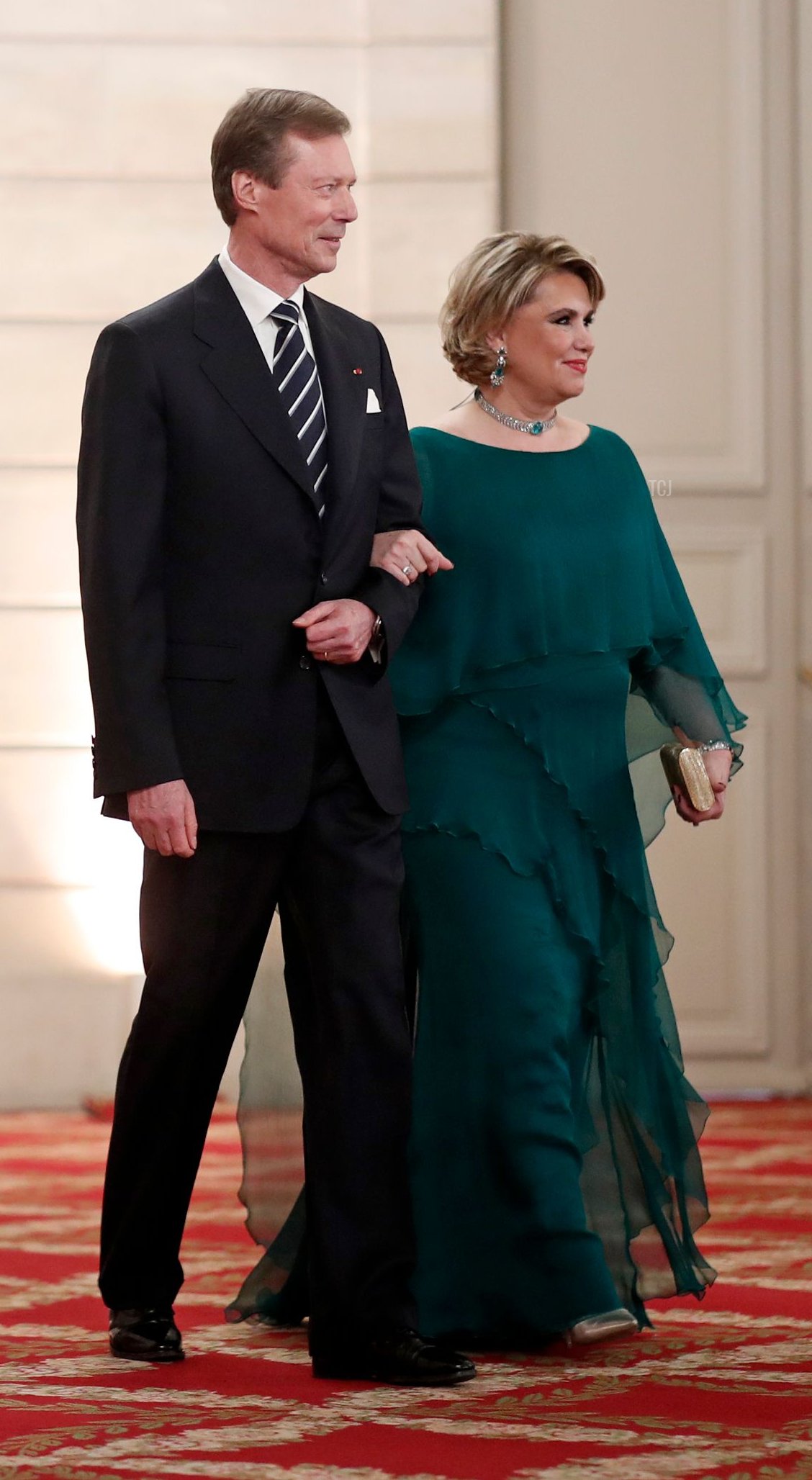 French President Emmanuel Macron, his wife Brigitte Macron, Grand Duke of Luxembourg Henri and his wife Maria Teresa, Grand Duchess of Luxembourg, arrive to a State dinner held at the Elysee Palace in Paris, on March 19, 2018