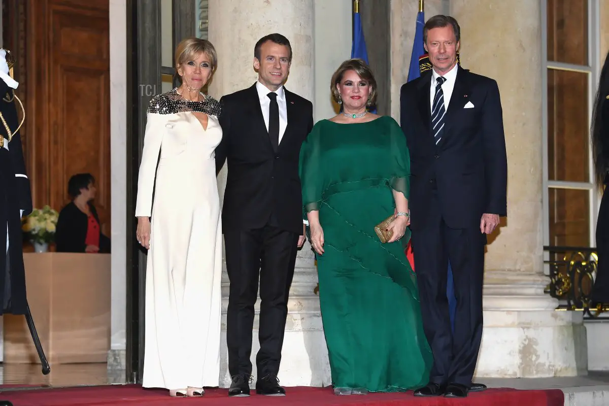 Grand-Duke Henri of Luxembourg (R), Grand-Duchess Maria Teresa of Luxembourg (2nd R), French President Emmanuel Macron (2nd L) and Brigitte Macron (L) attend a State dinner at the Elysee Palace on March 19, 2018 in Paris, France