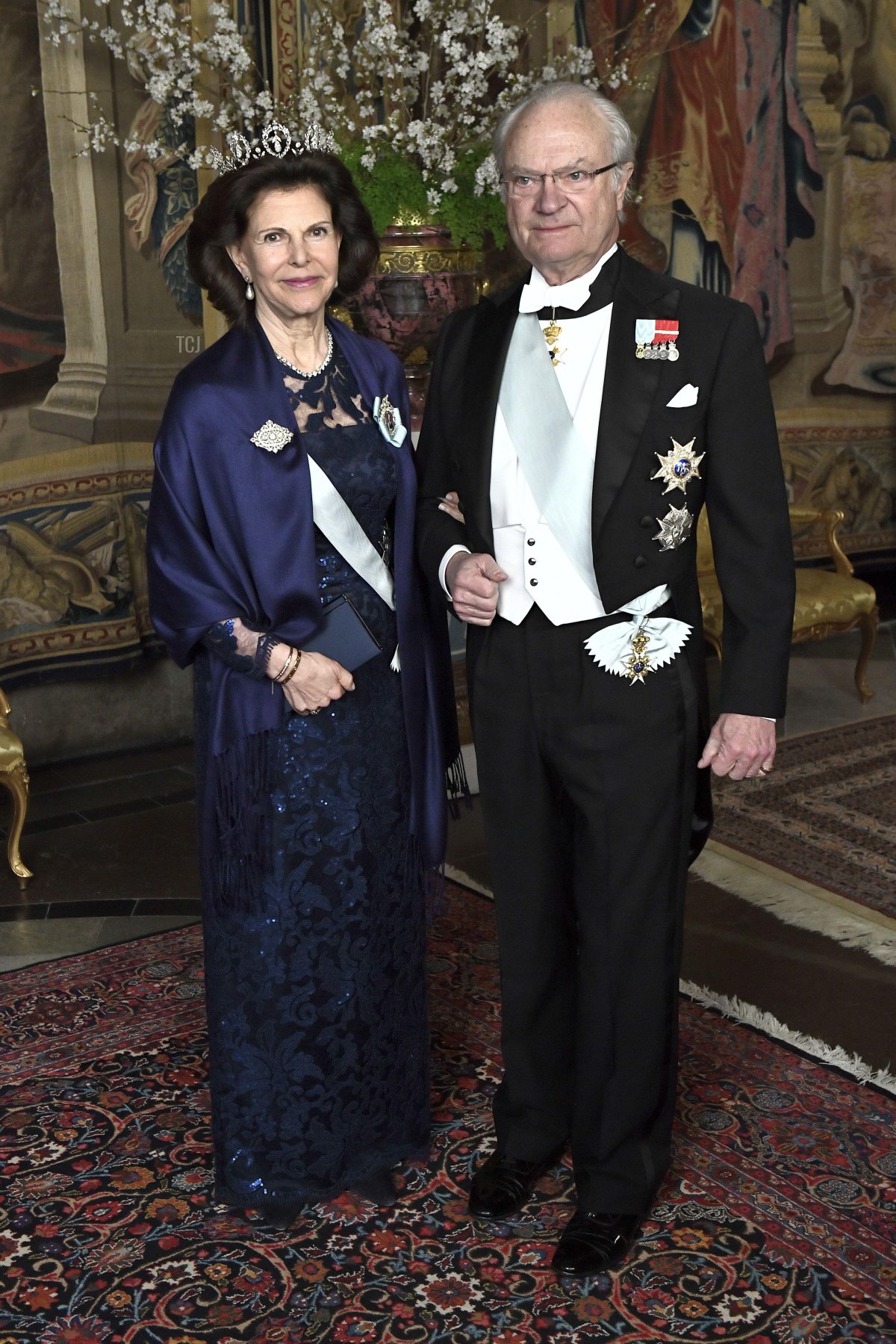 La Regina Silvia e il Re Carl XVI Gustaf durante la cena ufficiale al Palazzo Reale di Stoccolma, Svezia, 23 marzo 2017