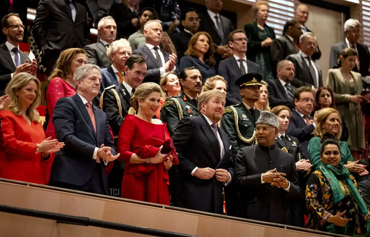 Queen Maxima and King Willem-Alexander of the Netherlands, India's President Ram Nath Kovind and his daughter Swati, react during the closing applause leave after a performance in the Muziekgebouw aan het IJ, on the last day of the state visit by the President of India