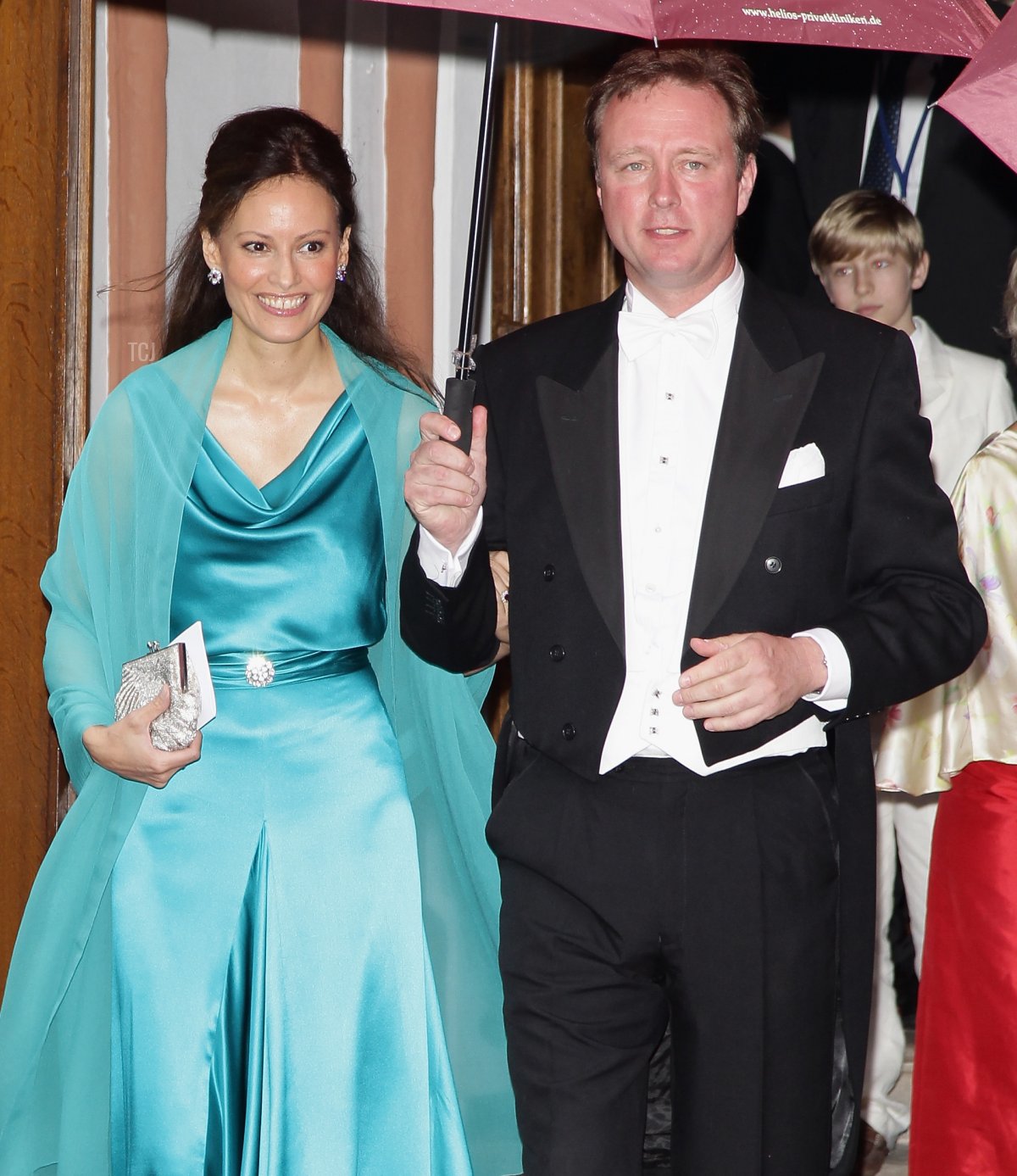 Gustav Prince of Sayn-Wittgenstein-Berleburg and Carina Axelsson attend the wedding of Princess Nathalie zu Sayn-Wittgenstein-Berleburg and Alexander Johannsmann at the evangelic Stadtkirche on June 18, 2011 in Bad Berleburg, Germany