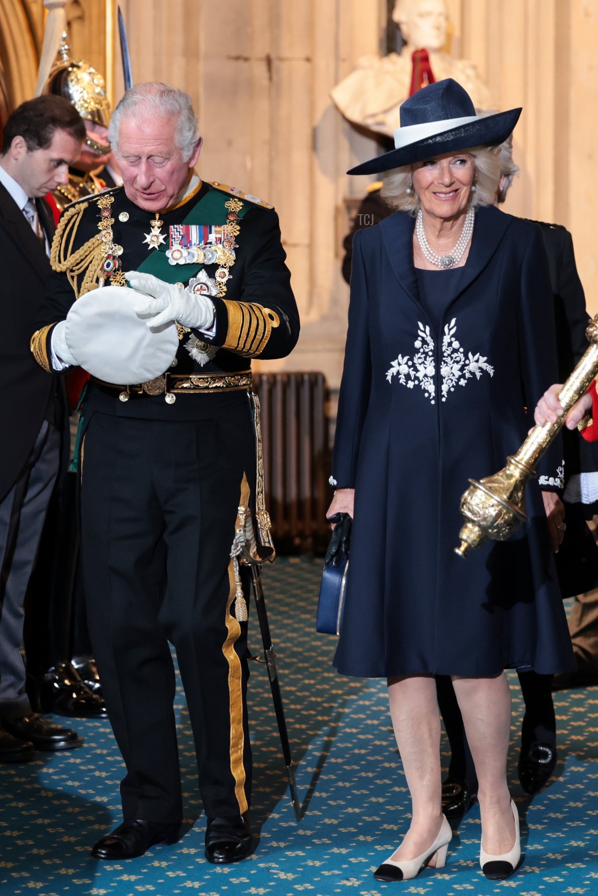 Il Principe Carlo e Camilla lasciano dall'Ingresso del Sovrano dopo la Cerimonia.