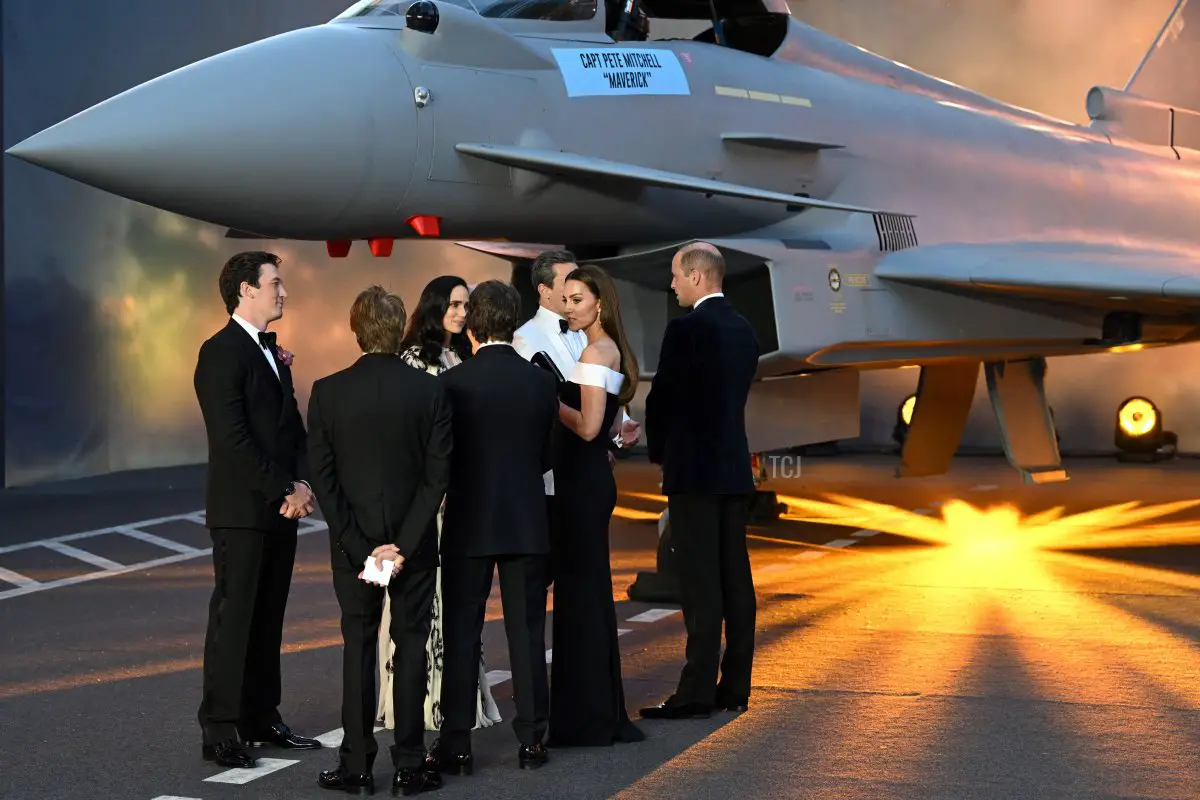 Britain's Catherine, Duchess of Cambridge, (2nd R) and Britain's Prince William, Duke of Cambridge (R), meet with US actor Tom Cruise (C) and other actors on the red carpet upon arrival for the UK premiere of the film 'Top Gun: Maverick' at the Leicester Square Gardens, in London, on May 19, 2022