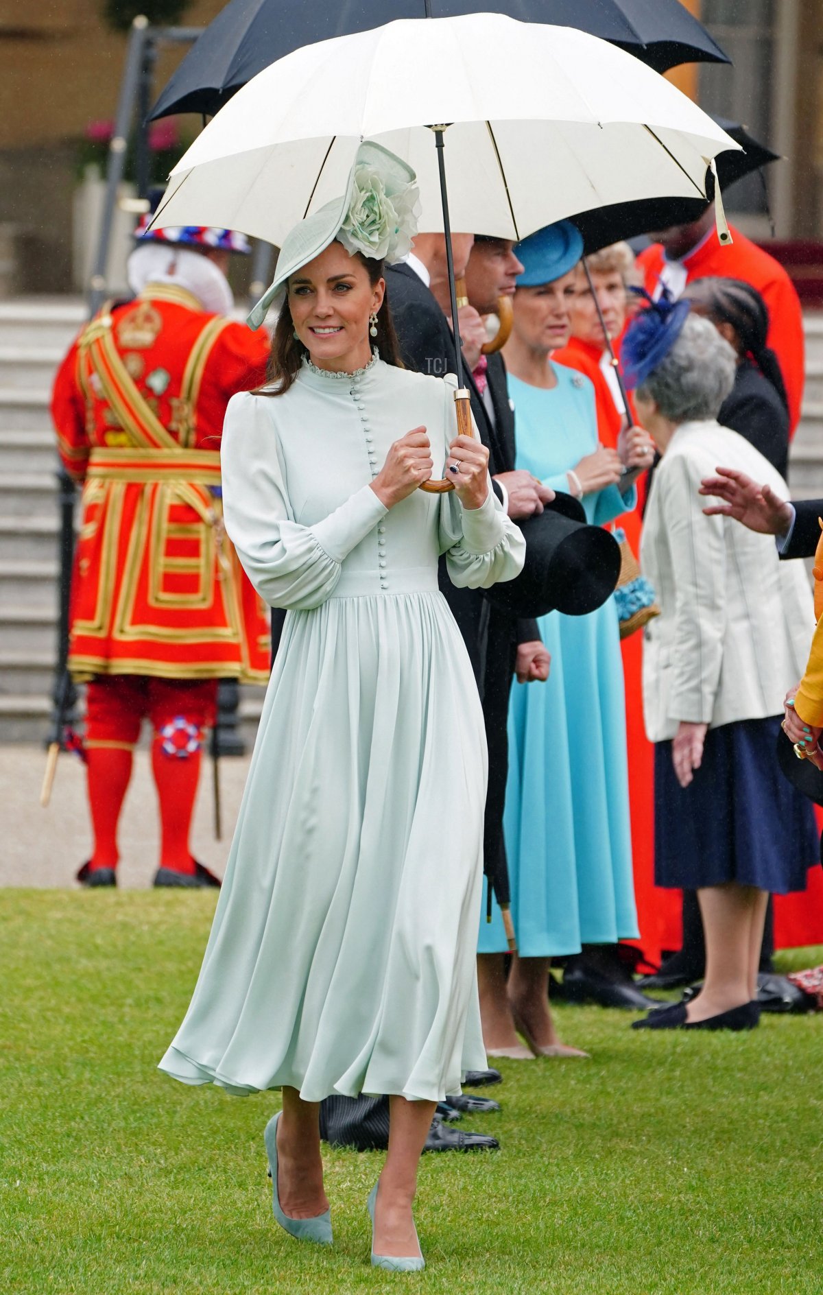 Britain's Catherine, Duchess of Cambridge meets with guests at a Royal Garden Party at Buckingham Palace in London on May 25, 2022