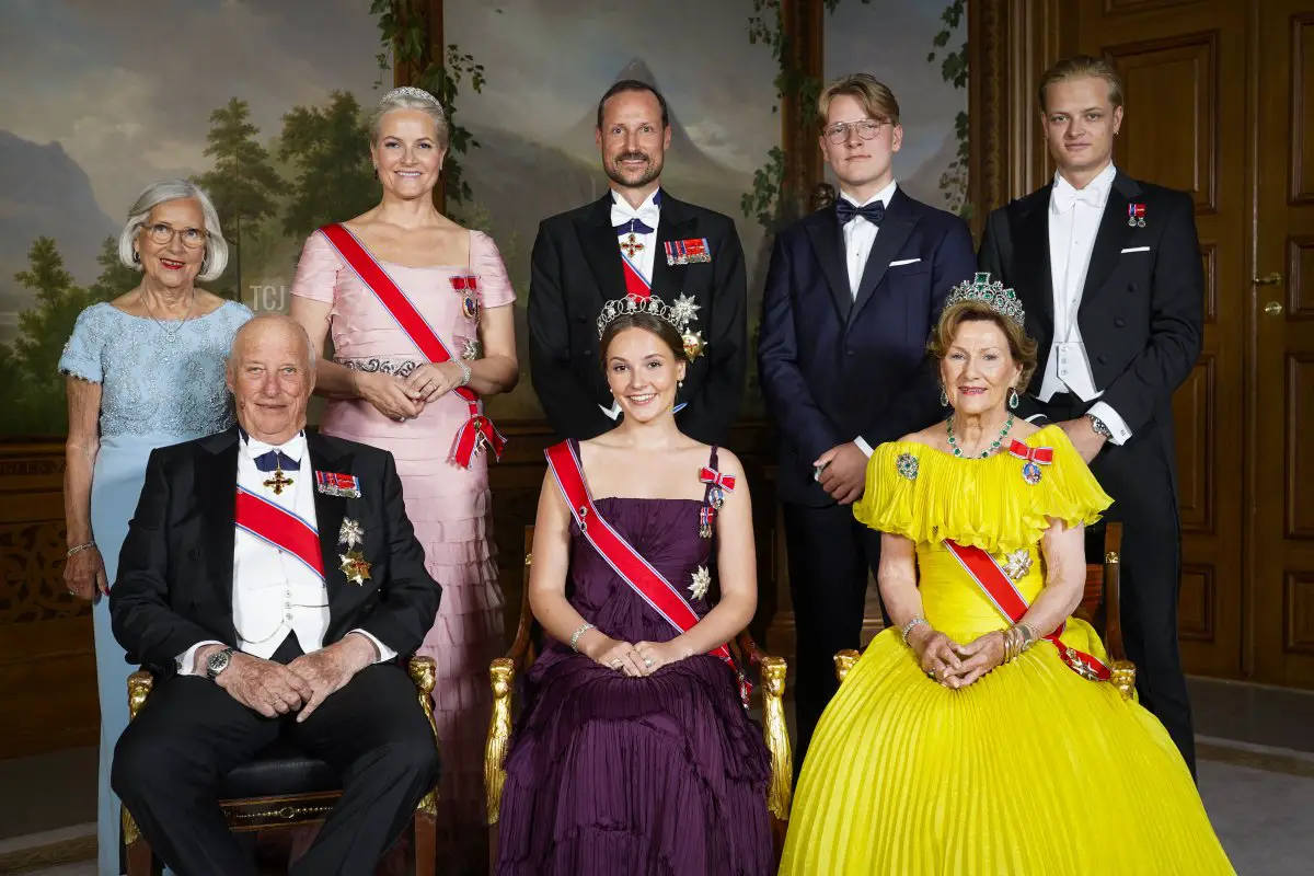 Norway's Princess Ingrid Alexandra (front C) poses for a family photo with (front L and R) Norway's King Harald V and Norway's Queen Sonja and (back LtoR) Marit Tjessem, Norway's Crown Princess Mette-Marit, Norway's Crown Prince Haakon, Norway's Prince Sverre Magnus and Marius Borg Hoiby on the occasion of a gala dinner for her 18th birthday in Oslo on June 17, 2022