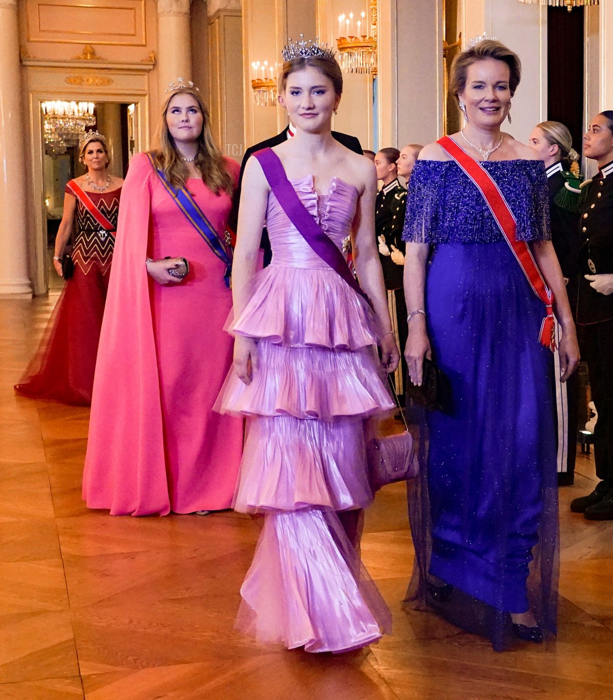 Princess Elisabeth (L) and Queen Mathilde of Belgium arrive for a gala dinner on the occasion of Norway's Princess Ingrid Alexandra's 18th birthday at the Palace in Oslo on June 17, 2022. - Princess Ingrid Alexandra turned 18 on January 21, 2022