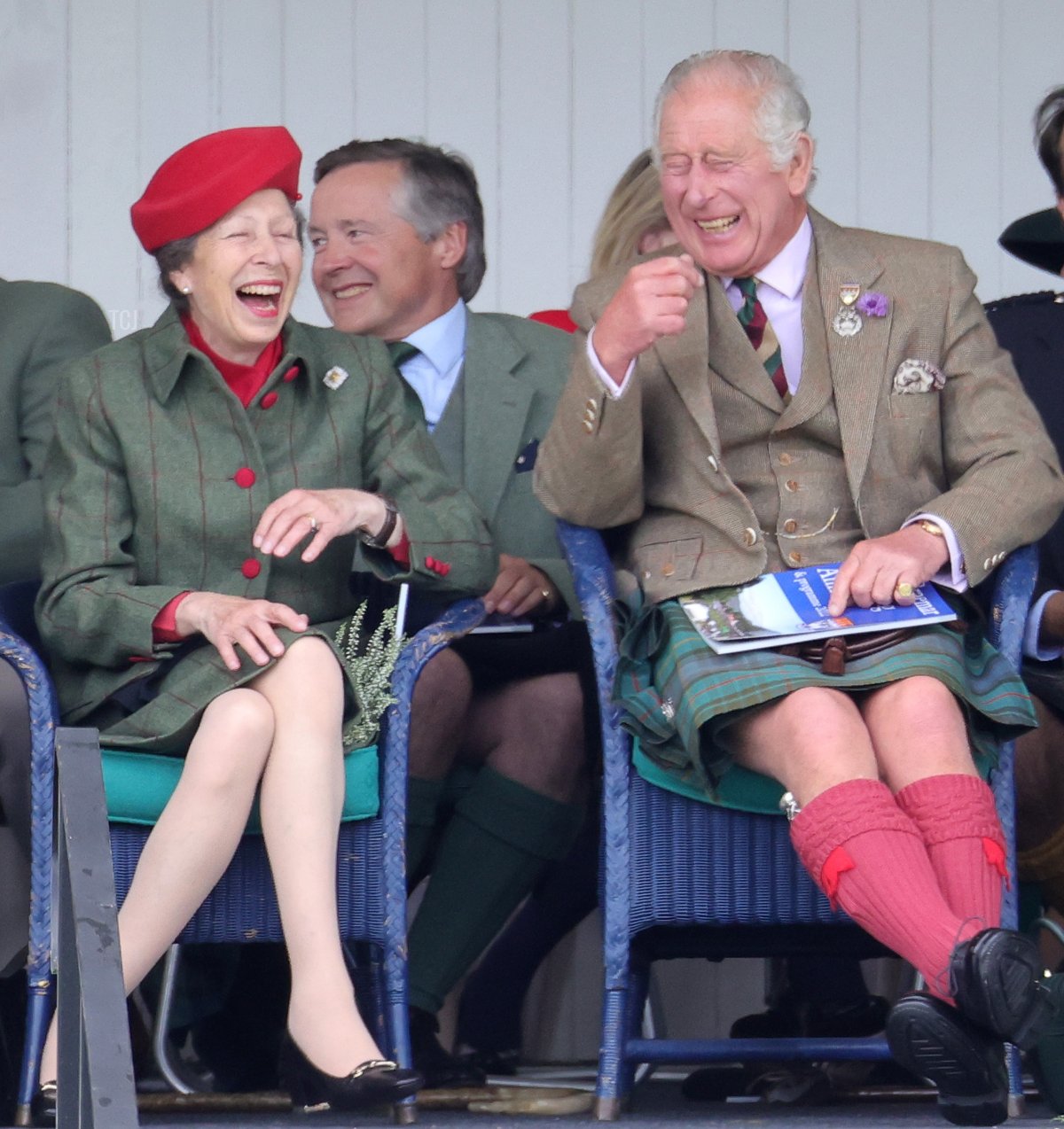 Anne, Princess Royal and Prince Charles, Prince of Wales, known as the Duke of Rothesay when in Scotland laughing during the Braemar Highland Gathering at the Princess Royal & Duke of Fife Memorial Park on September 03, 2022 in Braemar, Scotland