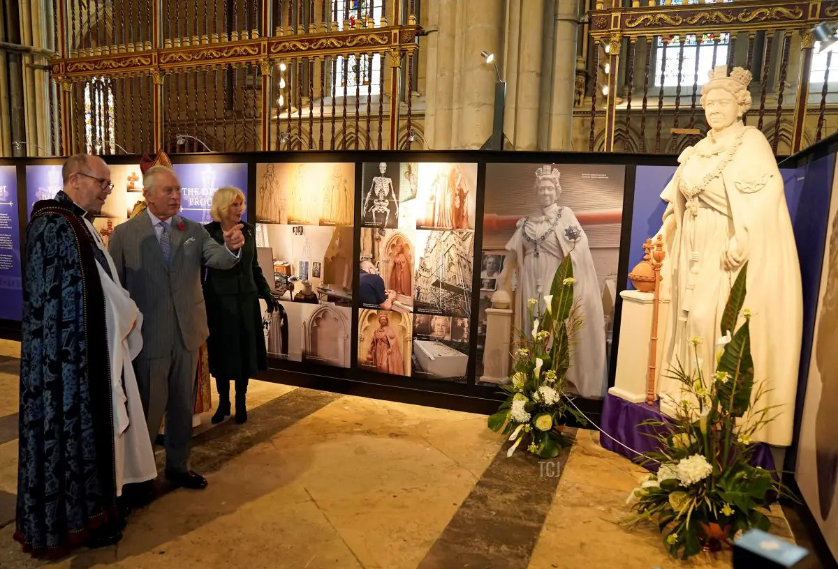 Britain's King Charles III and Britain's Camilla, Queen Consort are shown a scaled replica of the statue of his late mother Queen Elizabeth II, that he went on to unveil during his visit to York Minster in York, northern England on November 9, 2022 as part of a two-day tour of Yorkshire