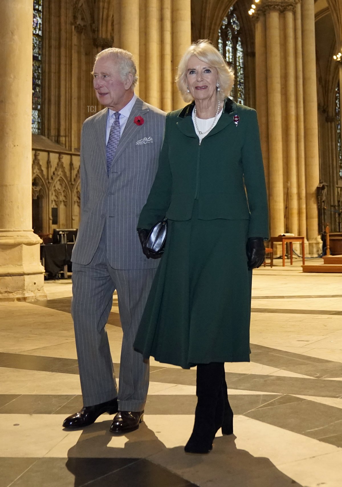 King Charles III of the United Kingdom and Camilla, Queen Consort of the United Kingdom attend a short service for the unveiling of a statue of Queen Elizabeth II at York Minster, and meet people from the Cathedral and the City of York, during an official visit to Yorkshire on November 9, 2022 in York, England