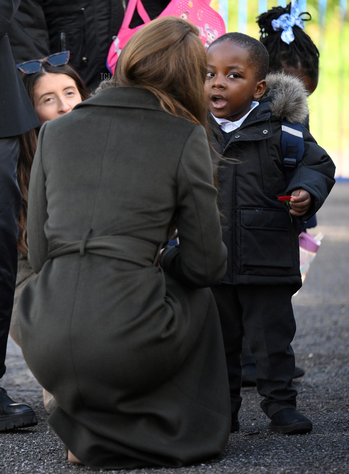 Catherine, Princess of Wales talks with children as she leaves after her visit to Colham Manor Children's Centre in Hillingdon with the Maternal Mental Health Alliance on November 9, 2022 in Uxbridge, England