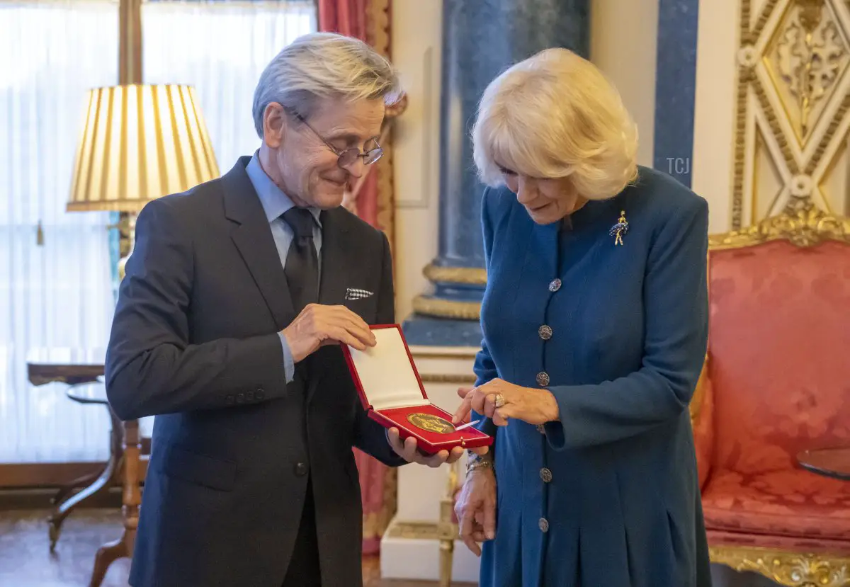 Camilla, Queen Consort presents Mikhail Baryshnikov with The Queen Elizabeth II Coronation Award, Royal Academy of Dance's (RAD) highest honour, in recognition of his immense contribution to ballet and the wider world of dance at Buckingham Palace on November 16, 2022 in London, England