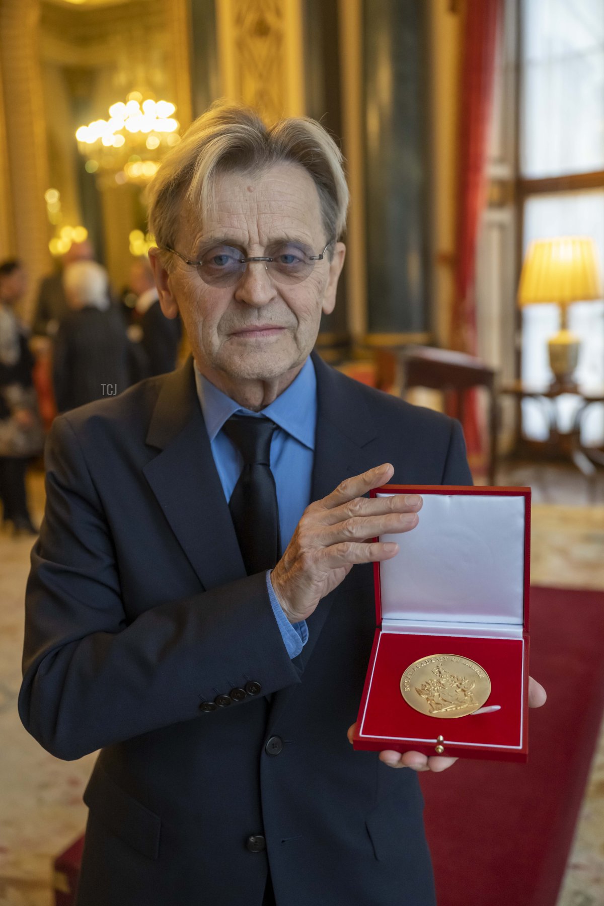 Mikhail Baryshnikov poses with The Queen Elizabeth II Coronation Award, Royal Academy of Dance's (RAD) highest honour, in recognition of his immense contribution to ballet and the wider world of dance after it was presented to him by Camilla, Queen Consort at Buckingham Palace on November 16, 2022 in London, England