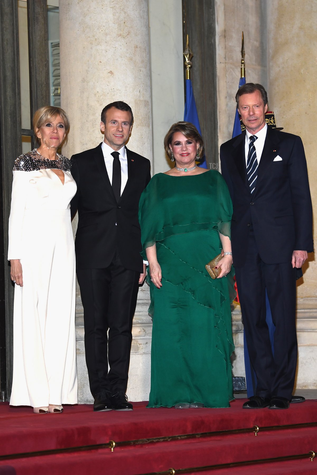 French President Emmanuel Macron and his wife, Brigitte, greet Grand Duke Henri and Grand Duchess Maria Teresa of Luxembourg ahead of a state dinner at the Elysee Palace in Paris on March 19, 2018 (Pascal Le Segretain/Getty Images)