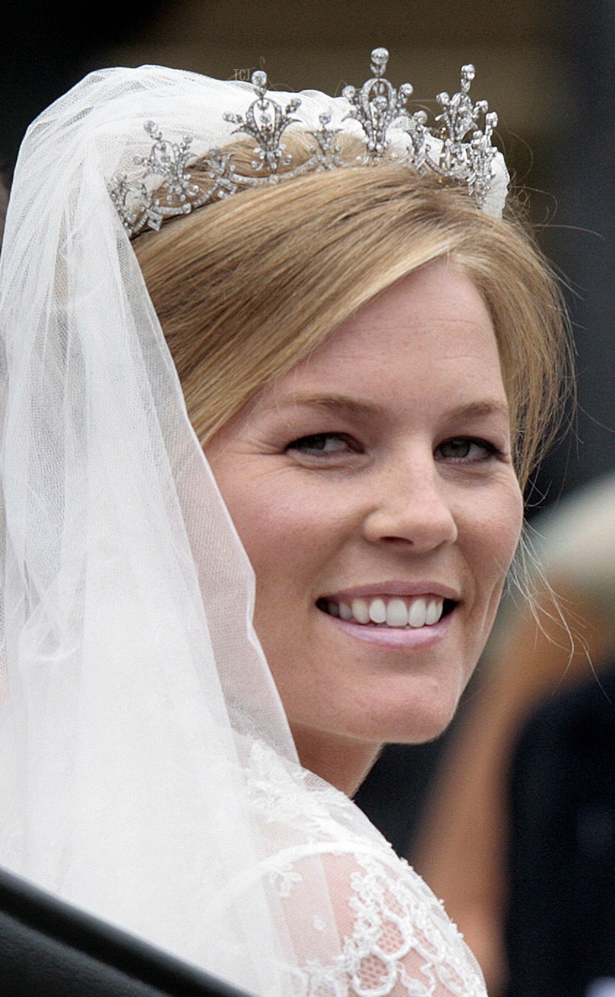 Peter Phillips 30, (not in photo) and Autumn Kelly 31, leave St George's Chapel in Windsor on May 17, 2008 after their marriage vows