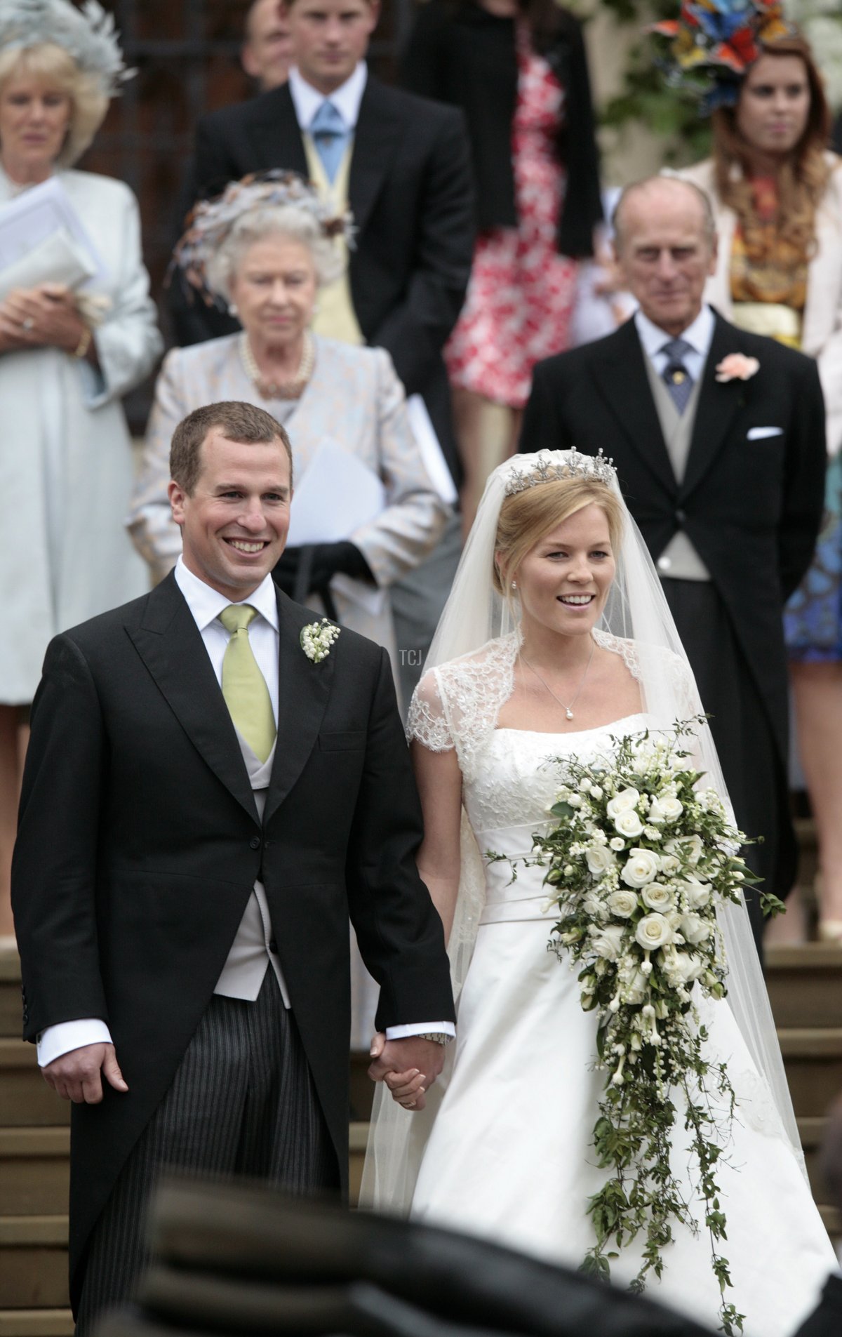 Peter Phillips 30, (L) and Autumn Kelly 31, (R) leave St George's Chapel in Windsor on May 17, 2008 after their marriage vows