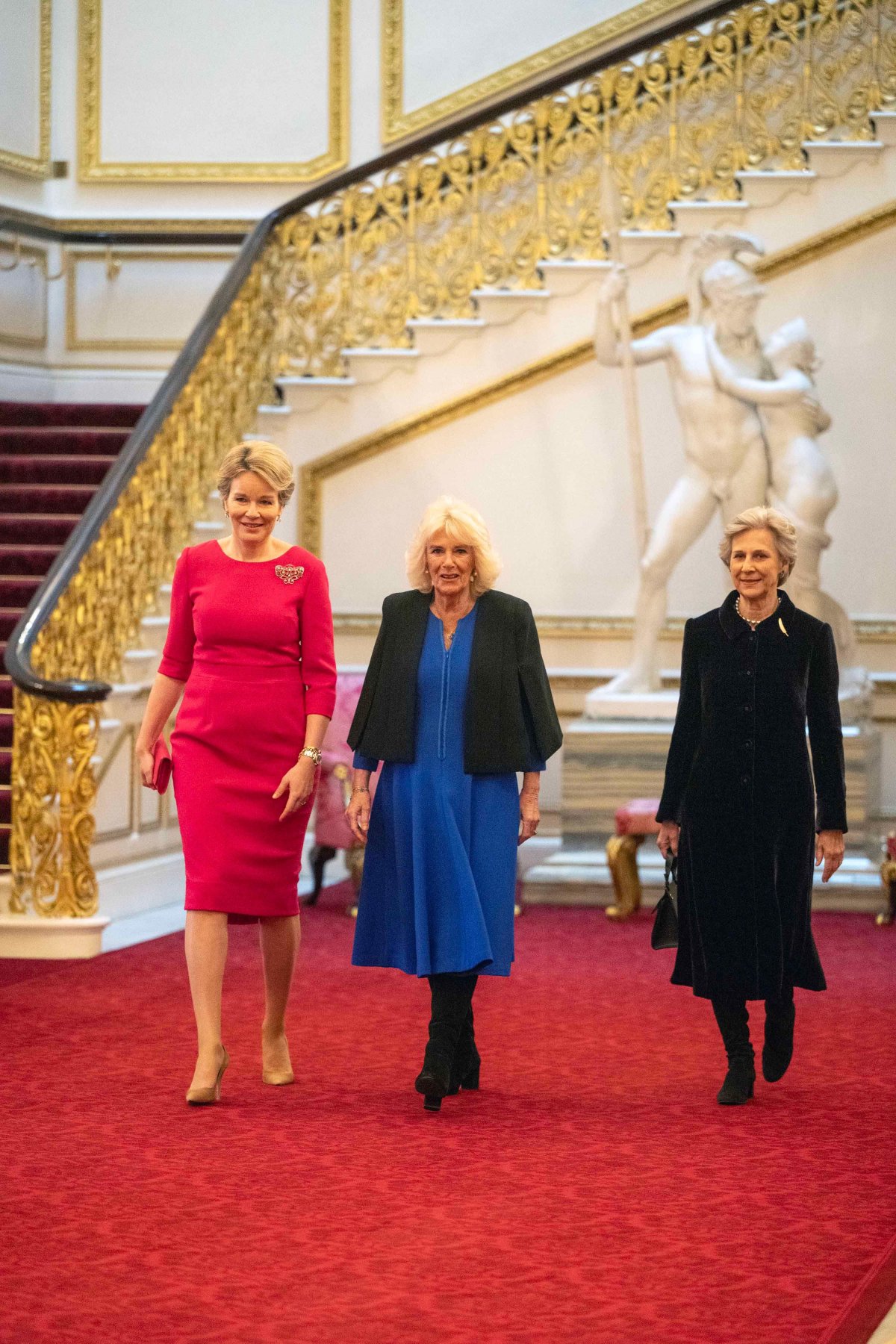 La regina Matilde dei Belgi, la Duchessa di Gloucester e la regina Camilla partecipano a una ricezione delle Donne del Mondo (WOW) per celebrare la Giornata Internazionale della Donna a Buckingham Palace il 12 marzo 2024 (Paul Grover/PA Images/Alamy)