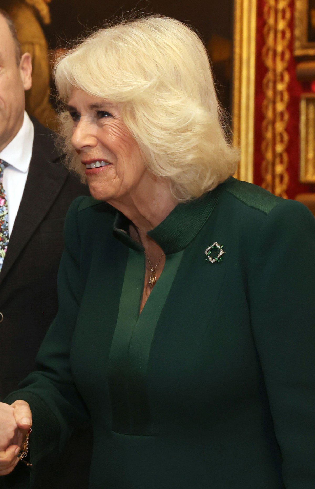 Queen Camilla of the United Kingdom attends a reception hosted by the Queen's Reading Room to mark World Poetry Day at Hillsborough Castle in Belfast on March 21, 2024 (Liam McBurney/PA Images/Alamy)