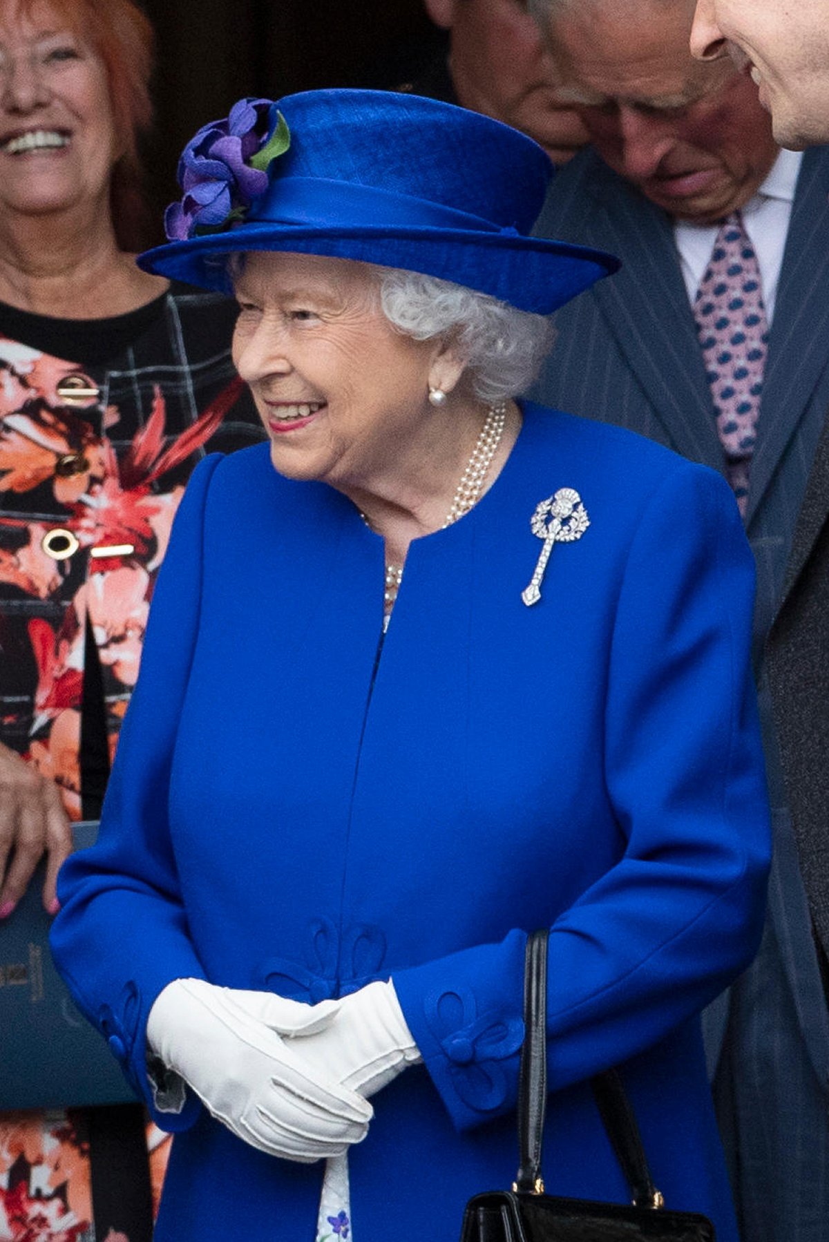 Regina Elisabetta II partecipa a una cerimonia per celebrare il ventesimo anniversario del Parlamento scozzese a Edimburgo il 29 giugno 2019 (Jane Barlow/PA Images/Alamy)