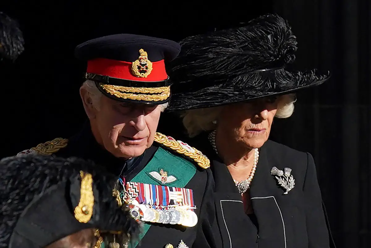 King Charles III and Queen Camilla leave a service of prayer and reflection for the life of Queen Elizabeth II at St Giles' Cathedral in Edinburgh on September 12, 2022 (Jacob King/PA Images/Alamy)