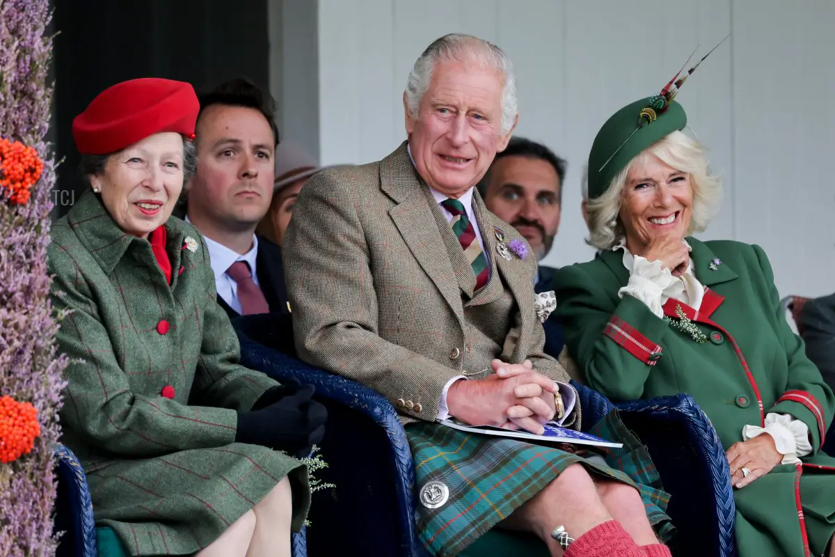 Anne, Princess Royal, Prince Charles, Prince of Wales, known as the Duke of Rothesay when in Scotland and Camilla, Duchess of Cornwall laughing during the Braemar Highland Gathering at the Princess Royal & Duke of Fife Memorial Park on September 03, 2022 in Braemar, Scotland