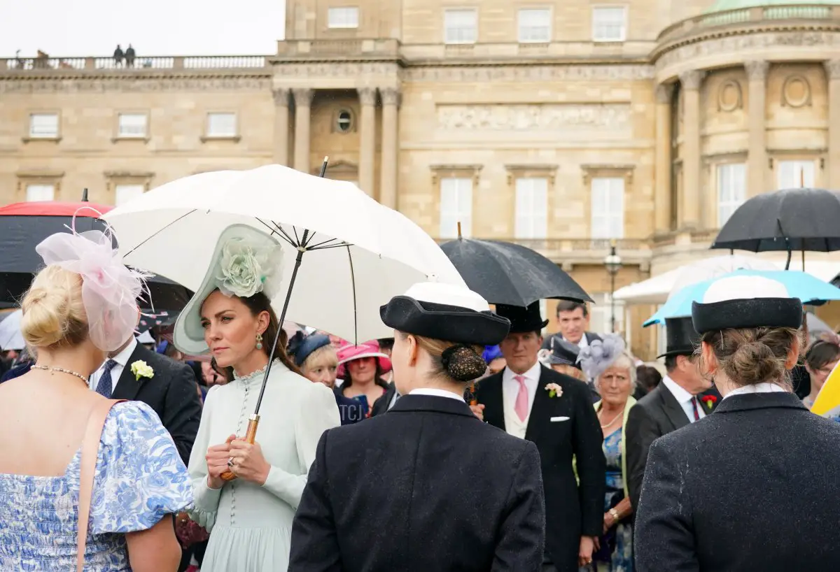 Catherine, Duchess of Cambridge speaks to guests during a Royal Garden Party at Buckingham Palace on May 25, 2022 in London, England