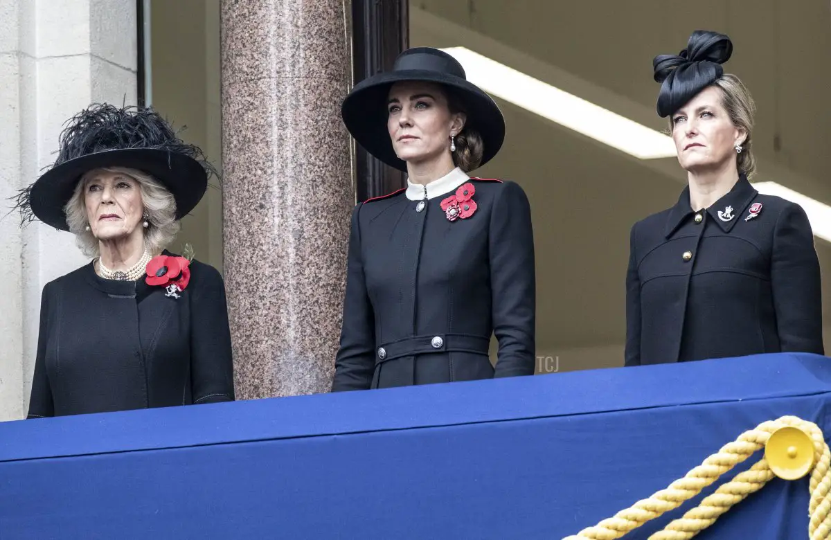 Catherine, Duchess of Cambridge stands with Camilla, Duchess of Cornwall (L) and Sophie, Countess of Wessex (R) on the balcony overlooking the Cenotaph during the National Service Of Remembrance on November 14, 2021 in London, United Kingdom