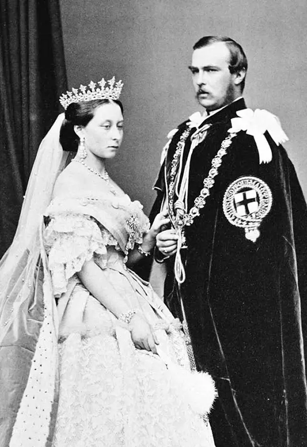 Princess Alice of the United Kingdom wears the Hesse Strawberry Leaf Tiara in a formal court portrait with her husband, Prince Louis of Hesse and by Rhine, taken by John Jabez Edwin Mayal, May 1863