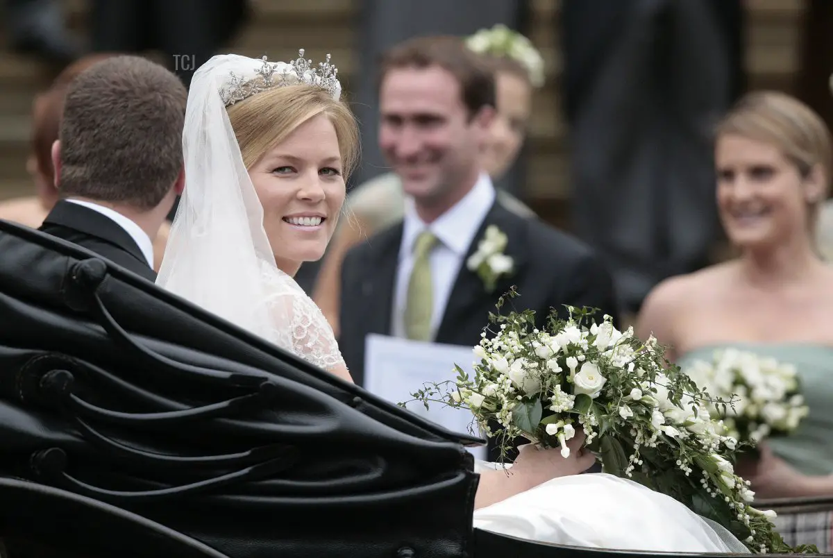 Peter Phillips 30, (L) and Autumn Kelly 31, (2nd R) leave St George's Chapel in Windsor on May 17, 2008 after their marriage vows