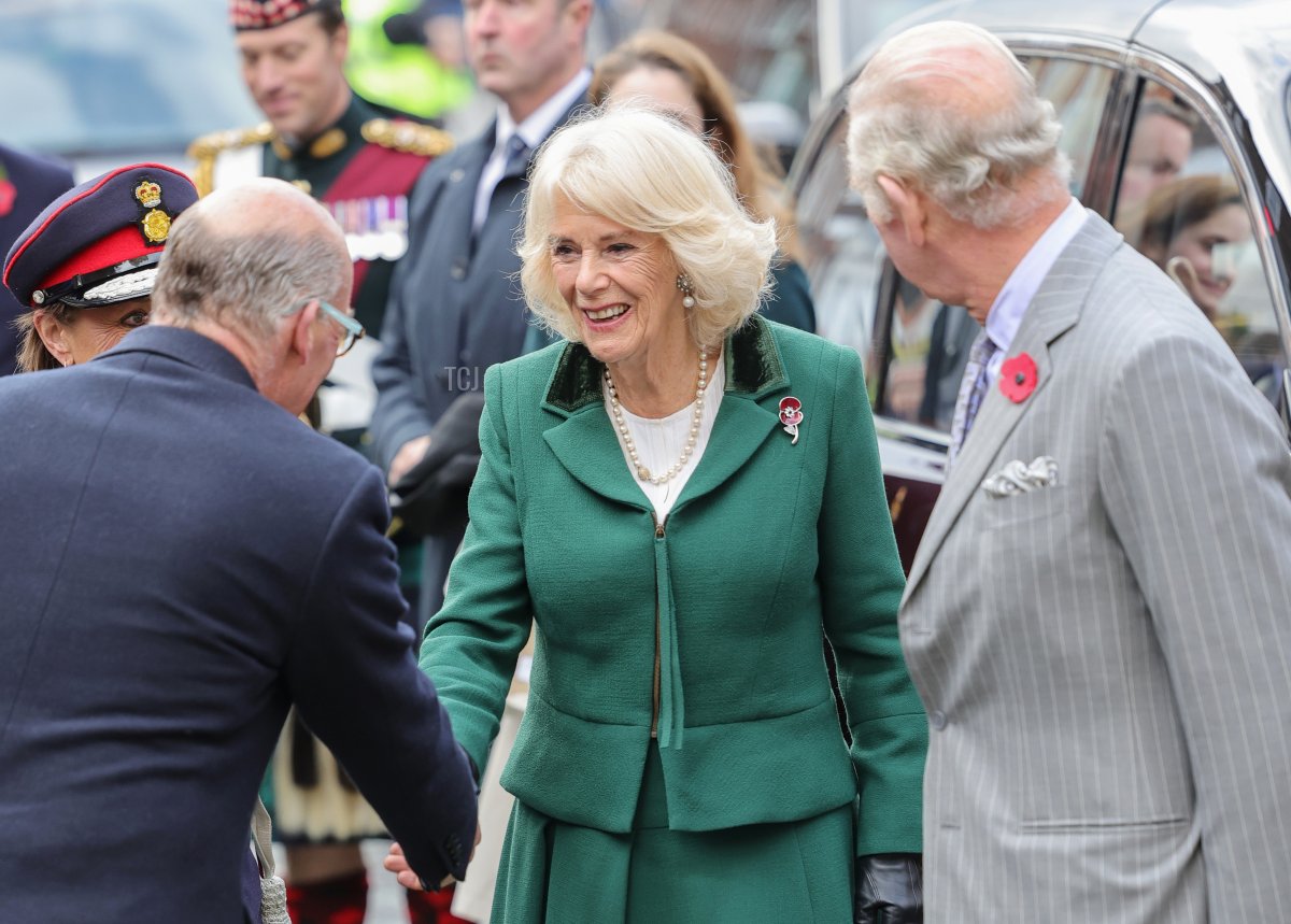 Camilla, Queen Consort shakes hands with a dignitary as she arrives with King Charles III for the Welcoming Ceremony to the City of York at Micklegate Bar during an official visit to Yorkshire on November 09, 2022 in York, England