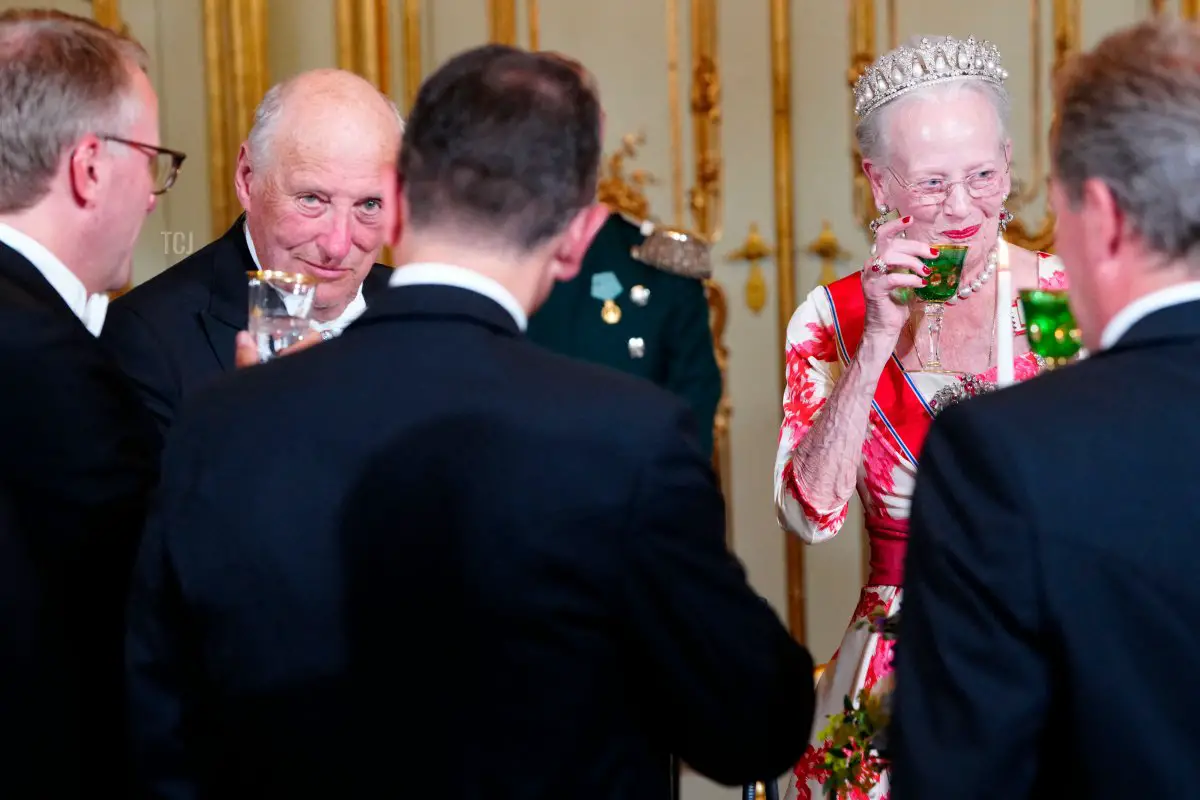 Queen Margrethe II of Denmark and King Harald V of Norway share a toast during a dinner in the Knight's Hall at Amalienborg Palace in Copenhagen, on June 15, 2023 (LISELOTTE SABROE/Ritzau Scanpix/AFP via Getty Images)