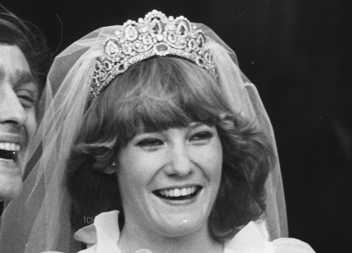 Gerald Grosvenor, 6th Duke of Westminster, and his new wife Natalia Phillips smiling happily on their wedding day outside St Mary's Church, Luton, February 20th 1978