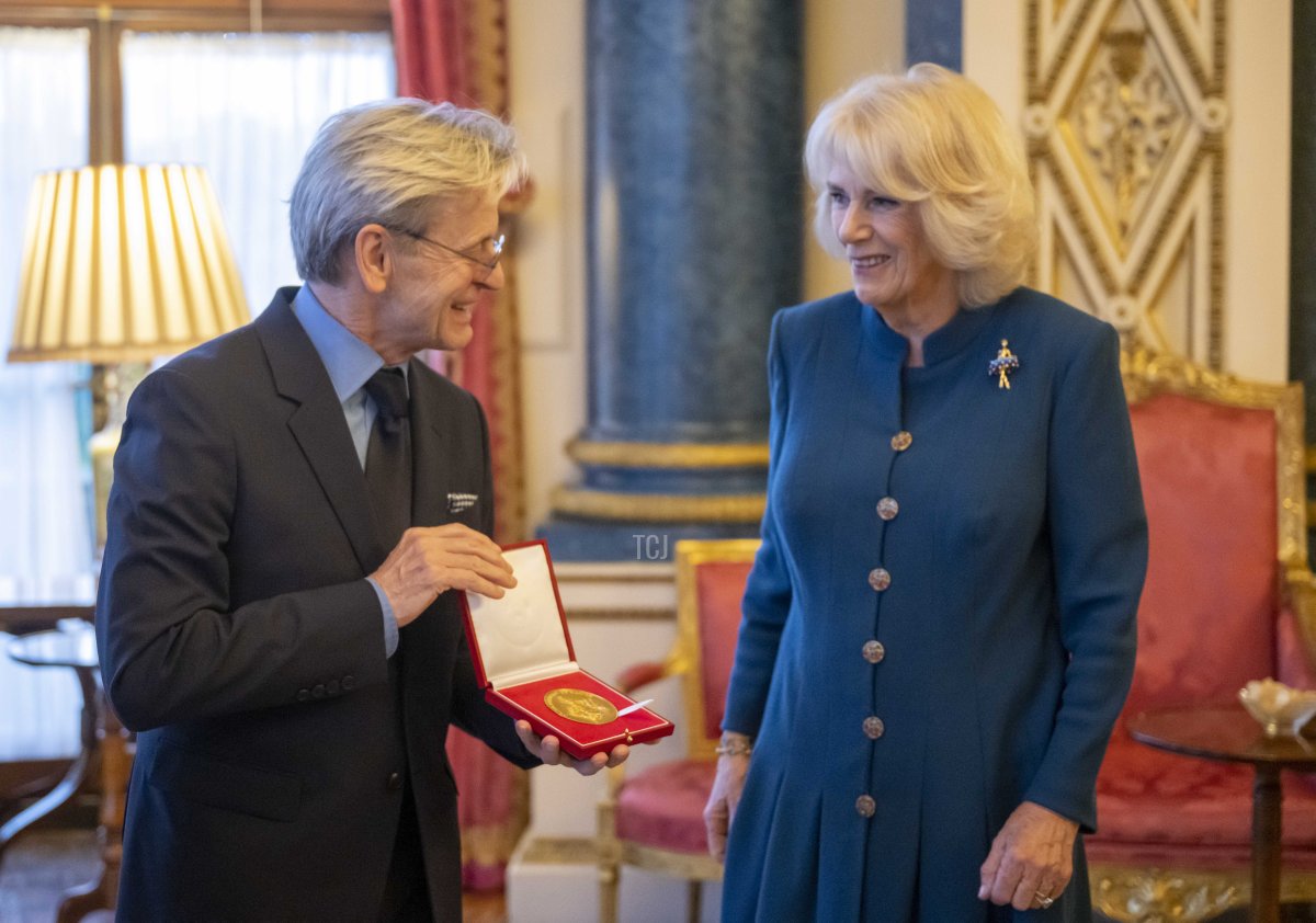 Camilla, Queen Consort presents Mikhail Baryshnikov with The Queen Elizabeth II Coronation Award, Royal Academy of Dance's (RAD) highest honour, in recognition of his immense contribution to ballet and the wider world of dance at Buckingham Palace on November 16, 2022 in London, England